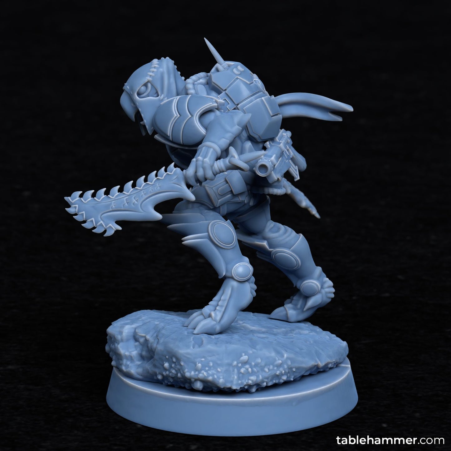 a toy figurine of a creature with a gun