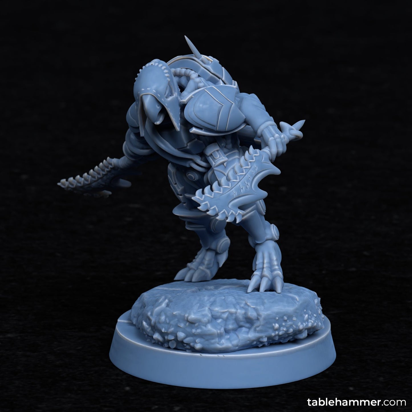 a blue plastic figurine of a demon