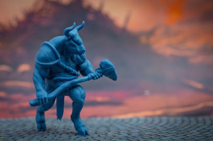 Resin 3D printed Minotaur holding a stone axe with a long wooden handle, and pieces of armor covering its bull body. Unpainted for miniature gaming and painting hobby