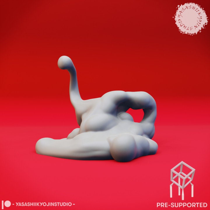 a white plastic animal laying on a red surface